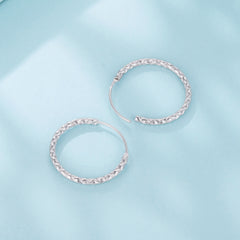 Carved Floral Hoop Earrings